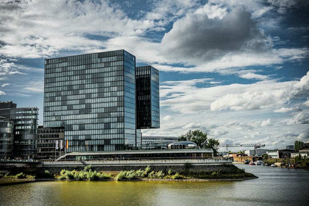 Modern glass office building exterior in a European business district